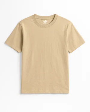 Plain light beige short-sleeve crew neck t-shirt laid flat on a white background.